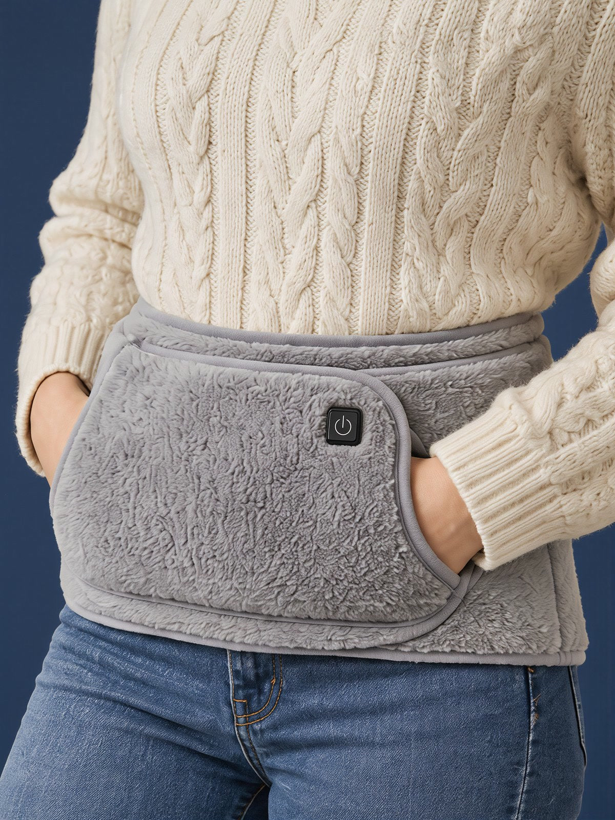 Wearing the heated belt with hands in the front pocket